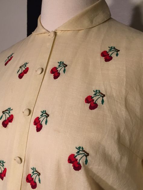 Beautiful Pettipoint Embroidered 1950's Cherry Blouse - Creme linen/cotton blend, 12 hand embroidered cherries, peter pan collar, fabric covered buttons, darts and nipped waist in the front and back Embroidery Khaka, Embroidered Cherries, Watermelon Embroidery, Cherry Blouse, Embroidery Apparel, Abaya Designs Latest, Saree Painting Designs, Hand Embroidery Dress, Embroidery On Kurtis