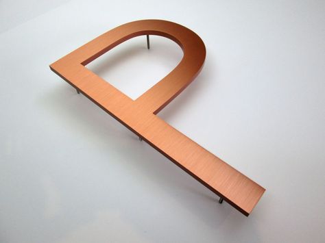 380mm high solid copper letters Copper Signage, Clinic Signage, Light Signage, Chicago Signs, Copper Letters, Hotel Signage, Peg Wall, Signage Wayfinding, Wayfinding Signage Design