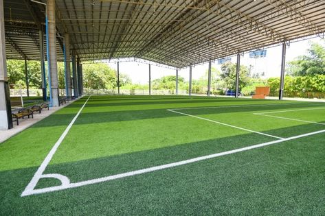 Futsal field with green grass | Premium Photo #Freepik #photo #tree #water #line #green Indoor Soccer Field, Futsal Court, Islamic University, Soccer Silhouette, Turf Backyard, Indoor Tennis, Game Arena, Badminton Court, Stadium Design