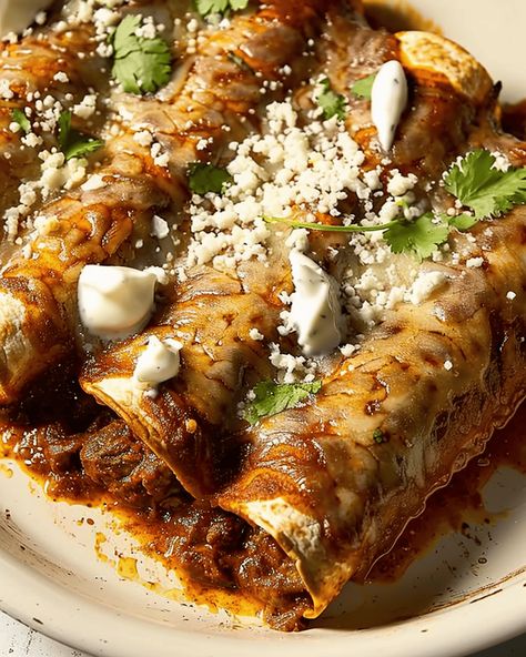 Mexican Beef Enchiladas Recipe Enchiladas are a classic Mexican dish that combines robust flavors with comforting textures. This recipe for Mexican Beef Enchiladas features tender shredded beef wrapped in soft ... Read more Mexican Beef Enchiladas, Beef Mole, Mole Enchiladas, Beef Enchiladas Recipe, Shredded Beef Enchiladas, Mexican Enchiladas, Beef Enchilada Recipe, Beef Wraps, Mexican Beef