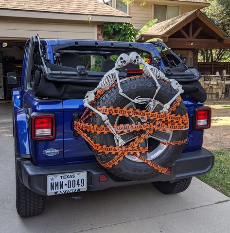 Halloween Decor For Jeeps, Skeleton On Jeep Tire Halloween, Halloween Jeep Tire Decorations, Halloween Decorations For Jeep Wrangler, Jeep Tire Halloween Decorations, Jeep Decorations For Halloween, Jeep Trunk Or Treat, Jeep Skeleton, Trunk Or Treat Ideas For Jeep Wrangler