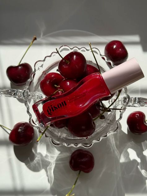 perfect red gloss #cherry #lipgloss #gisou #makeup #cherrylips Strawberry Lip Gloss Aesthetic, Cherry Lip Gloss Aesthetic, Gisou Lip Oil Cherry, Lip Gloss Aesthetic Pics, Cherry Chapstick Aesthetic, Cherry Makeup Products, Red Lipgloss Aesthetic, Cherry Vibes Aesthetic, Cherry Coded Aesthetic