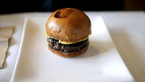 Best Umami Burger Recipes - Men's Journal Grow Mushrooms At Home, Parmesan Crisps Recipe, Umami Burger, How To Grow Mushrooms, Crisps Recipe, Oven Dried Tomatoes, Cipollini Onions, Grow Mushrooms, Brioche Bun