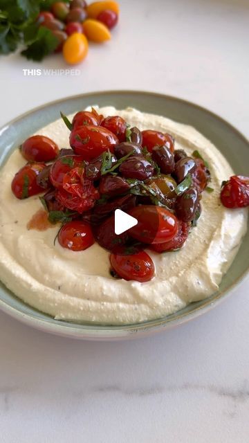 Sarah Pound on Instagram: "WHIPPED FETA DIP WITH ROASTED CHERRY TOMATOES & BABY KALAMATA OLIVES The perfect entertaining starter! This dip is so easy and takes no time to throw together. I’m using the new @alwaysfreshau Baby Kalamata Olives in this recipe, they pair perfectly with the roasted cherry tomatoes. Serves 6 (as a starter) Ingredients: 400g cherry tomatoes 1/2 cup @alwaysfreshau Baby Kalamata Olives 1 tablespoon dried Italian herbs 1 whole garlic bulb 2 tablespoon extra virgin olive oil 2 tablespoon parsley, finely chopped 200g feta cheese 2 tablespoons cream cheese 1 lemon, zest & juice 1 tablespoon extra virgin olive oil 2 teaspoons honey Sea salt & cracked black pepper Method: 1. Preheat oven to 200 degrees. In a small baking dish, add the cherry tomatoes, baby kalama Baked Olives, Whipped Feta Dip, Baby Tomatoes, Italian Herbs, Feta Dip, Tomato Dip, Roasted Cherry, Whipped Feta, Roasted Cherry Tomatoes