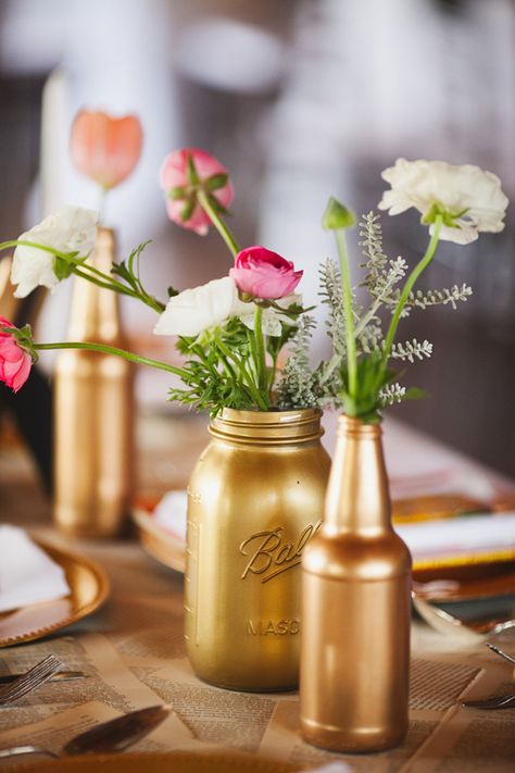 DIY-ed centerpieces Bottles With Flowers, Spray Paint Mason Jars, Spray Painted Bottles, Outdoor Cocktail Party, Golden Anniversary Party, Flower Centrepieces, 50th Wedding Anniversary Decorations, 50th Anniversary Decorations, Gold Mason Jars