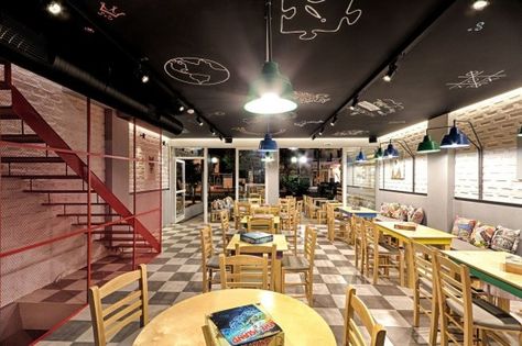 Alaloum Board Game Café Architects: Triopton Architects Location: Athens, Greece Games Cafe, Board Game Cafe, Painted Brick Walls, Game Cafe, Interior Design Games, French Drain, Design Café, Coffee Shop Design, Cafe Ideas