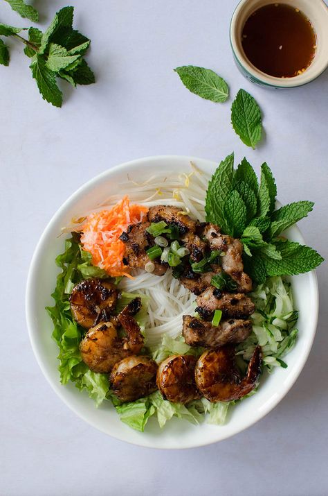 Vietnamese Vermicelli Bowl with Grilled Pork and Shrimp | Sprig and Flours Vietnamese Vermicelli Bowl, Vietnamese Vermicelli, Bun Thit Nuong, Thit Nuong Recipe, Vermicelli Bowl, Pork And Shrimp, Vermicelli Recipes, Asian Fusion Recipes, Diner Recept