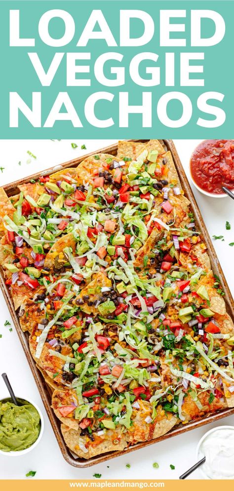 Say goodbye to boring old nachos and hello to these loaded veggie nachos! With layers upon layers of colorful veggies and ooey-gooey cheese, these vegetarian sheet pan nachos are guaranteed to be a crowd pleaser. Ready in under 30 minutes and can be served as an appetizer, snack or full meal. Perfect for Game Day, Cinco De Mayo, movie night or a fun and easy weeknight dinner! | www.mapleandmango.com Veggie Nachos Recipe, Vegetarian Sheet Pan, Veggie Nachos, Sheet Pan Nachos, Pan Nachos, Colorful Veggies, Homemade Nachos, Green Snacks, Homemade Fajita Seasoning