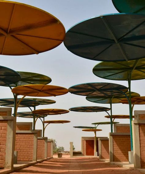 atelier masomi uses colorful metal canopies to build dandaji market in niger Best Architecture, Big Building, French Colonial, Canopy Design, Metal Canopy, Natural Ventilation, Co Design, Architecture Project, Sustainable Design