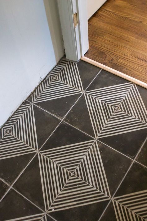 Aztec Bathroom Tile, Black White Bathroom With Pop Of Color, Tile For Mudroom Floor, Tile Stencil Bathroom, Stencil Tile Floor Bathroom, Mid Century Kitchen Backsplash Tile, Geometric Floor Pattern, Different Tiles On Floor, Hardwood And Tile Combinations