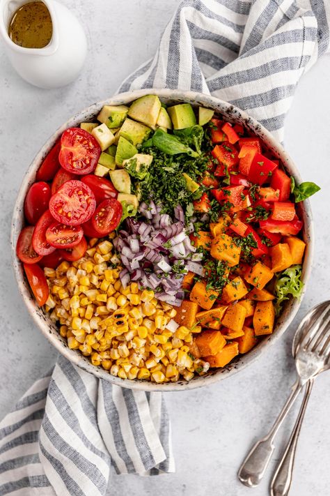 This grilled corn salad with avocado is a healthy side you’ll be making again and again. With a colourful mix of charred corn, roasted sweet potatoes, fresh veggies and creamy avocado, it’s the perfect choice for any summer cookout. #vegan #salad #picnic Colourful Salad, Grilled Corn And Avocado Salad With Feta Dressing, Grilled Corn And Avocado Salad With Feta, Roasted Corn And Avocado Salad, Avocado Bean And Corn Salad, Avacado Corn Salad, Pan Fried Sweet Potatoes, Corn Avocado Salad, Grilled Corn Salad