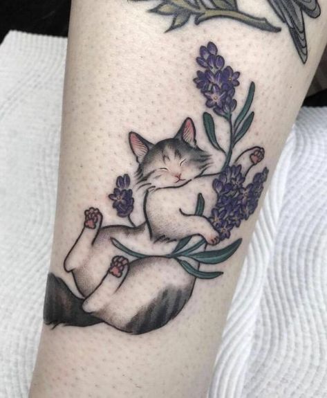 Uncover the meanings behind cat tattoos across cultures and beliefs. Learn about fascinating symbolism as well as the best ideas for inspiration. Cute Cat Tattoo Ideas, Cat Tattoo Ideas, Cute Cat Tattoo, Lavender Tattoo, Black Cat Tattoos, Sweet Tattoos, Cat Tattoo Designs, Cute Little Tattoos, Cute Tiny Tattoos