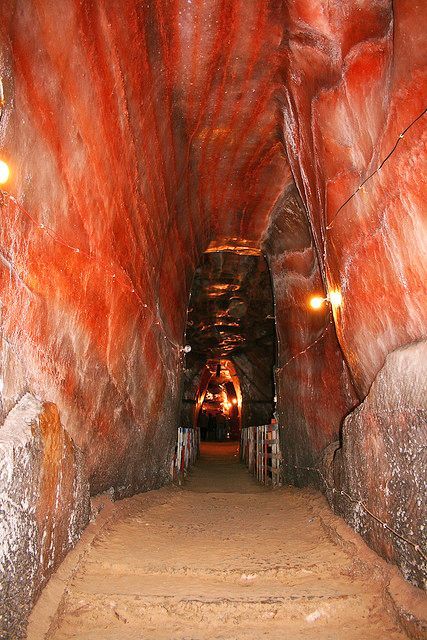 The Khewra Salt Mine is Pakistan's largest and oldest salt mine and the world's second largest. It is a major tourist attraction, drawing up to 250,000 visitors a year. The mine is a part of a salt range. Pakistan Tourism, Salt Mine, Salt Cave, Pakistan Travel, Punjab Pakistan, Salt Of The Earth, South Asia, Tourist Attraction, Places To See