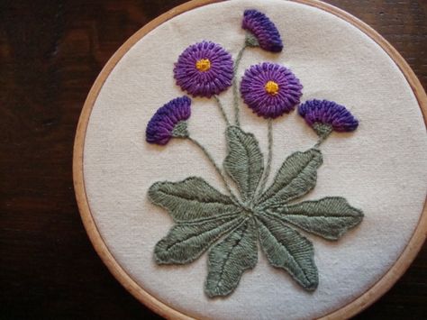 Embroidery, perle no. 8. Long Blanket stitch leaves, bullion knots, needleweaving, French knots and lazy daisies. Long Bullion Knot Embroidery Designs, Long Bullion Embroidery Designs, Bullion Knot Embroidery Designs, Knot Embroidery Designs, Bullion Knot Embroidery, Stitch Leaves, Bullion Knot, Lavender Embroidery, Embroidered Embellishments