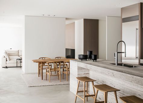 Project VV is a minimal house located in Kortrijk, Belgium, designed by Pieter Vanrenterghem. The architects were tasked in creating a warm and simple home that would adapt to the clients’ lifestyle with a design that would be timeless. The designers chose to utilize natural materials, such as dark oak and travertine, that would not only age well, but create a more natural environment for the residents. The architects continuously refined the design throughout the whole process, constantly quest Soft Minimalism, Interior Minimalista, 카페 인테리어 디자인, Minimal Home, Minimalism Interior, Interior Architect, Decoration Inspiration, Minimalist Interior, Interior Projects