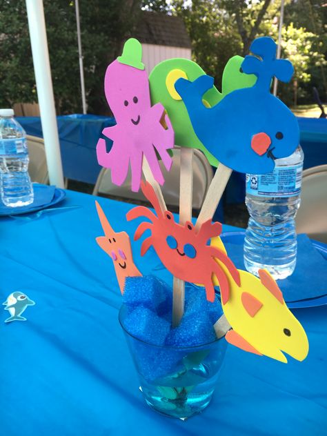 Under the sea theme birthday party centerpieces Fish Table Centerpieces, Sea Centerpiece Ideas, Under The Sea Table Centerpieces, Under The Sea Centerpiece Ideas, Under The Sea Centerpiece, Sea Theme Birthday Party, Aquarium Party, Aquarium Birthday, Sea Theme Birthday