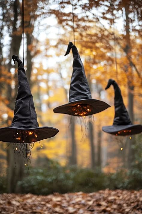 "Turn your Halloween decor into something spellbinding with DIY Floating Witch Hats! 🎩🧙‍♀️ Perfect for a magical, eerie display. #WitchHatsDIY #FloatingDecorInspiration #HalloweenIdeas" Halloween Garden Decor, Witch Decorations Halloween, Deco Halloween Diy, Witch Hats Diy, Witch Decorations Diy, Floating Witch Hats, Witch Party Decorations, Floating Witch, Apothecary Design