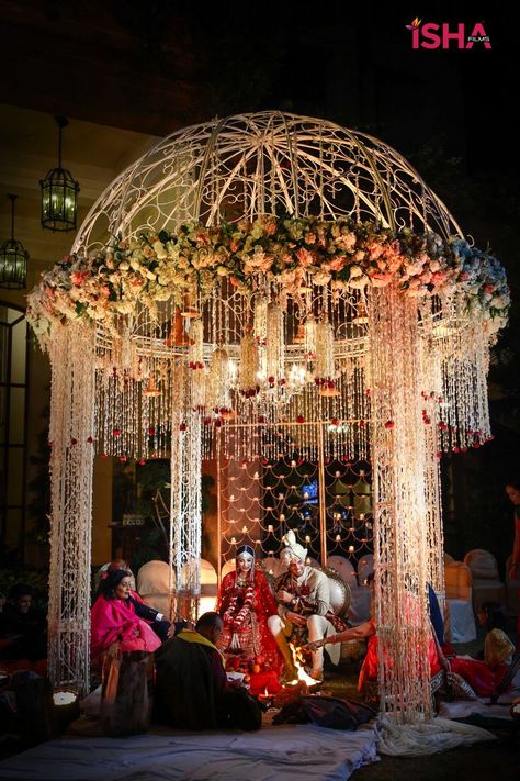 Photo of round mandap with hanging floral strings and iron structure Round Mandap, Indian Wedding Ideas, Mandap Design, Pink Wedding Decorations, Royal Theme, Wedding Hall Decorations, Diy Wedding Inspiration, Hindu Ceremony, Desi Wedding Decor