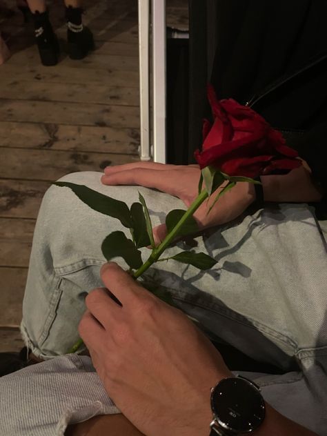 Man With Roses In Hand Aesthetic, Rose Giving Hand Couple, Guy Holding Flowers Aesthetic, Man Holding Flowers Aesthetic, Red Guy Aesthetic, 2024 Relationship, She Loves Me Musical, Boy Holding Flowers, Rose Day Pic