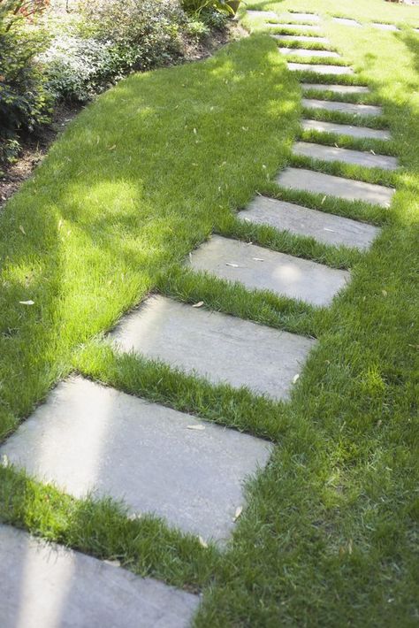 When active feet beat a compacted pathway through your struggling lawn, it&#39;s best to bow to the inevitable. Instead of renting aerators, installing awkward fencing or... Backyard Pathway, Front Yard Walkway, Stepping Stone Walkways, Garden Pavers, Backyard Walkway, Walkway Landscaping, Paver Walkway, Walkways Paths, Garden Stepping Stones