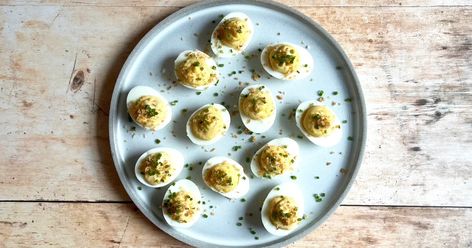 Take deviled eggs to the next level with Caesar dressing. The yolks are mixed with Caesar dressing until creamy and piped into the whites. Spring Entertaining, Caesar Salad Dressing, Caesar Dressing, Lettuce Leaves, Caesar Salad, Anchovies, Hard Boiled, Croutons, Deviled Eggs