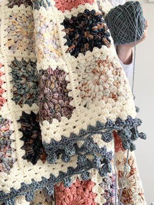 Hygge Burst Blanket x The Cloudflare Collection by Hue Loco…. — NautiKrall Crochet Trendy Granny Square Blanket, Solid Crochet Squares Pattern Free, Crochet Granny Square Quilt, Hygge Burst Granny Square Blanket, Half Skein Crochet Project, Crochet Blankets Ideas, Granys Square Pattern, Granny Square Blanket Pattern Free, Variegated Yarn Crochet Patterns