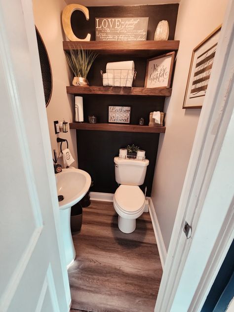 Powder room make over Half Bath Wood Wall, Bathroom Ideas With Accent Wall, Small Bathroom Accent Wall Behind Toilet, Black Accent Wall Bathroom Half Baths, Black Wall In Bathroom Ideas, Black Accent Bathroom Wall, Black Feature Wall Bathroom, Half Bath Black Accent Wall, Black Wall Behind Toilet