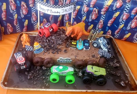 Trucks And Dinosaurs Party, Dinosaur And Trucks Birthday, Monster Truck And Dinosaur Cake, Monster Truck And Dinosaur Party, Monster Truck Dinosaur Birthday Party Ideas, Dinosaur And Monster Truck Birthday Party, Dinosaur Monster Truck Cake, Monster Truck Dinosaur Party, Dino Monster Truck Party