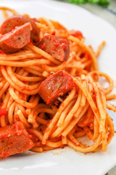 Spicy sausage spaghetti is a cheap meal that is family friendly. Use kielbasa, ground, brats or Italian sausage in homemade sauce and pasta. Ninja Foodi Spaghetti, Spaghetti With Sausage, Noodles And Cheese, Sausage Spaghetti, How To Make Spaghetti, Cheap Meal, Mild Italian Sausage, Spaghetti Recipe, Spicy Sausage