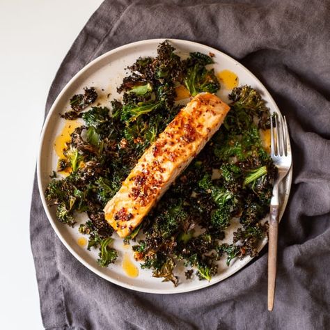 Chili Crisp Sheet Pan Salmon with Kale | Anova Precision® Oven Recipes Chili Crisp Oil, Steam Oven Recipes, Chili Crunch, Sheet Pan Salmon, Oven Salmon, Pan Salmon, Cooked Salmon, Crispy Kale, Chili Crisp