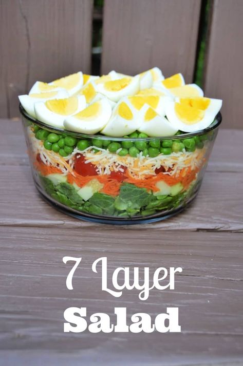 Delicious seven layer salad recipe. Easy to make and always a hit at gatherings. Seven Layer Salad Recipe, Layered Salads, 7 Layer Salad, Layer Salad, Seven Layer Salad, Salad Kale, Layered Salad Recipes, Resep Salad, Summer Cookout