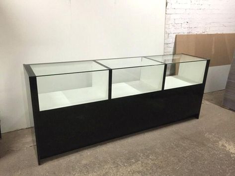 black display counters for mobile phone shop Mobile Shop Counter Design, Mobile Shop Counter, Mobile Shop Counter Design Modern, Glass Counter, Display Counter Design, Glass Counter Design Shop, Counter With Glass Display, Counter Design For Jewellery Shop, Perfume Display Stand Retail Design