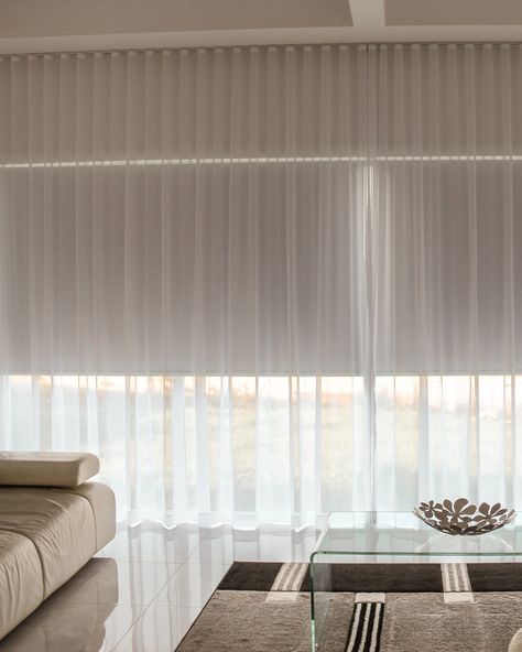 ✨ Transform Your Living Space with Style! ✨ Upgrade your home with our elegant sheer curtains and roller blinds. This stunning living room features a clean, modern design perfectly complemented by our window treatments. 🏡 Create the perfect blend of light and privacy. 💫 Elevate your home's aesthetic effortlessly. 🌟 Visit us at The Blind Factory for more inspiration! #HomeDecor #InteriorDesign #WindowTreatments #ModernLiving #TheBlindFactory #SheerCurtains #RollerBlinds Roller Blind With Sheer Curtain, Blinds And Curtains Together, Curtains Over Blinds, Roller Blinds Living Room, Modern Roller Blinds, Sheers Curtains Living Room, Blockout Blinds, Built In Shelves Living Room, Voile Curtains