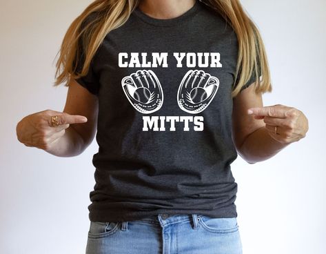 "Baseball T-Shirt, Calm Your Mitts Shirt, Baseball Game Tee, Baseball Player Gift, Baseball Season Shirt, Baseball Tee Gifts, Softball Shirt,, Baseball Lover Tee, Baseball Shirt, Baseball Mom Shirt, Baseball Player Tee, Baseball Fan Shirt, Funny Softball Shirt, Baseball Fan Gifts, Baseball Game Day, Baseball Player Gift, Baseball Season Tee, Baseball Sayings Tee, Ballpark Shirt, Baseball Game Tee  Hello! Welcome to my store, I'm delighted to see you here. My store's main goal is to make you happy. I see you as a friend, not just a customer. Please contact me if you have any questions or want to get a custom-made design. I'm sure you'll love my designs. If you liked the design but didn't like the shirt color we have, please contact me. Or if you want me to add a little customization, feel f Calm Your Mitts Shirt, Funny Baseball Shirts, Ballpark Outfit, Baseball Sayings, Funny Softball Shirts, Baseball Outfits, Baseball Fan Shirts, Gifts For Baseball Players, Baseball Mom Shirt