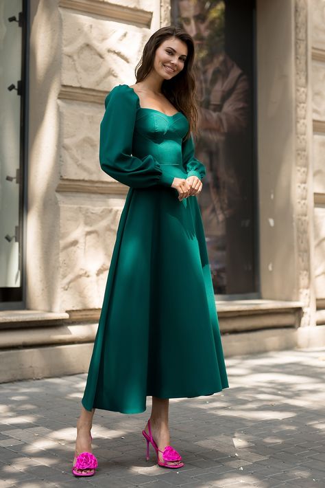 Radiate breezy sophistication in our Emerald Puff-Sleeve Midi Dress. The puff sleeves and midi length make it a chic and versatile choice for various occasions, from daytime gatherings to evening events. #emerald #dress #dresses #mididress #weddingdress #sweetheartdress #partydress #womenwear #eveningdress #promdress #dresslover Emerald Dress, Backless Midi Dress, Wear Store, Blouse Sale, Sweetheart Dress, Suits For Sale, Silk Slip Dress, Puff Sleeve Dresses, Women's Wear