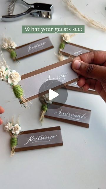 New Jersey Wedding/Event Calligraphy + Signage on Instagram: "Perfect placecards for a Boho or Rustic Chic event🤍 These calligraphy place cards cater to the natural, genuine aesthetic of the bohemian or rustic (might I even say farmhouse) decor, with a touch of sophistication elevating its overall appearance. No matter the theme, we can achieve your desired look with the change of color palettes, flower choice, and binding material. Save this for inspo later! #eventplacecards #weddingtablesetting #weddingtabledecor #bohobirthday #rusticwedding flower place cards, pretty place cards, calligraphy place cards, boho chic event decor, boho chic baby shower, diy boho event decorations, #modernrusticdecor rustic wedding ideas boho graduation ideas, modern rustic wedding, vellum placecards" Genuine Aesthetic, Unique Place Cards Wedding, Diy Wedding Place Cards, Diy Name Cards, Wedding Vellum, Boho Event, Flower Place Cards, Boho Graduation, Wedding Ideas Boho