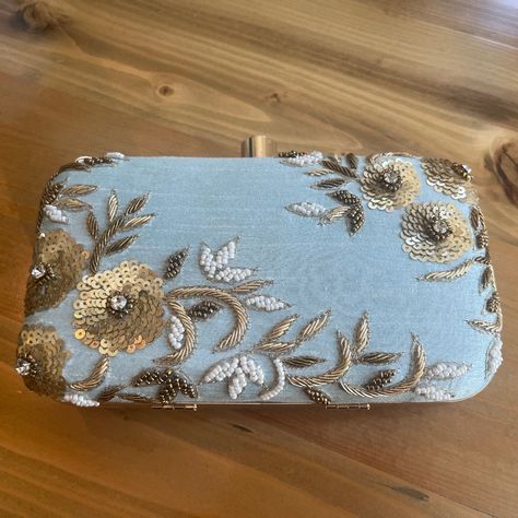 New And Never Used Beautiful Clutch Purse That Came From Karmaplace In Light Blue And Gold! Bought For My Son’s Wedding But It Didn’t Quite Match The Blue Embroidery In My Dress! It Is A Gorgeous Purse.Floral Embroidered, 8 Inches Long, 4.5 Inches High. Has A Gold Removable Strap. Perfect For A Wedding Or Any Dress Up Occasion! Wedding Color Blue, Silk Clutch, Blue Embroidery, Embroidered Bag, My Dress, Blue And Gold, Clutch Purse, My Son, Blue Gold