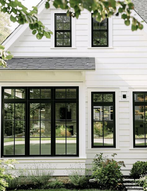 Upgrading your home’s exterior can increase not only your curb appeal but also your home’s property value. Black windows are a unique-looking accent for the exterior of your home and have recently become a popular choice in home decor. Finding the right siding to complement your black windows may seem like a small detail but […] Black Paned Windows Exterior, Modern Front Window Design, Beige Siding Black Windows, White Houses Black Windows, Cape Cod Black Windows, Black Cottage Windows, Small White House Black Windows, Black Windows White Siding, Farmhouse Windows Black