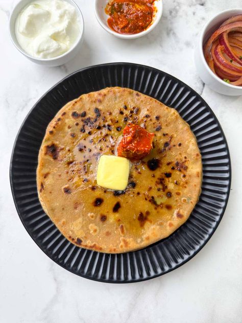 aloo paratha stacked on a plate with butter and pickle on the top with yogurt, laccha onion on the side Aloo Ka Paratha, Alu Paratha, Paneer Paratha, Stuffed Paratha, Rolled Roast, Potato Stuffed, Aloo Paratha, Potato Filling, Stovetop Pressure Cooker