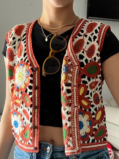 colorful crochet vest, gold accessories, sunglasses Yellow Crochet Vest, Sweater Vest In Summer, Crochet Vest Outfit Fall, Colourful Vest Outfit, Crochet Vest With Buttons, Summer Crochet Vest, Crochet Button Vest, Crochet Button Up Vest, Boho Vest Outfit