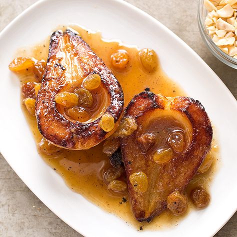 Roasted Pears with Golden Raisins and Hazelnuts A two-stage cooking process yields tender, beautifully caramelized fruits. Caramelized Fruit, Roasted Pears, Hazelnut Recipes, Donut Toppings, Roasted Pear, Roasted Apples, Cookie Toppings, Caramel Tart, America's Test Kitchen Recipes