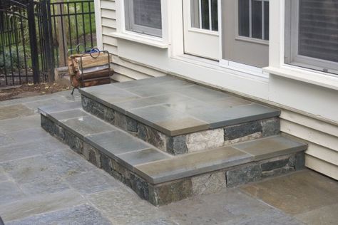 Paver Patio With Steps Down From House, Steps From Back Door To Patio, Stairs From Back Door To Patio, Backdoor Steps To Patio, Fireplace With Seating, Front Porch Stone Steps, Patio Step, Concrete Front Steps, Garden Slabs