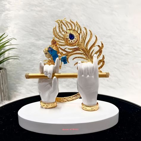 Experience the divine aura of this Gold Plated Lord Krishna Hands Idol, featuring a resplendent peacock feather. Its vibrant colors and intricate design make it a perfect addition to your home decor or a thoughtful gift for loved ones. 🌈🕊️ Dm us for more information 🤠 #divineartistry #krishnaidol #peacockfeather #elegantdecor #spiritualvibes #shopnow #intricatecraftsmanship #shoponlinenow #divinepresence #divineaura #shopinstagram #etherealbeauty #homedecor #sanskritiartsindia Krishna Home Decor, Ethereal Beauty, Peacock Feather, Elegant Decor, Lord Krishna, The Divine, Intricate Design, Krishna, Thoughtful Gifts