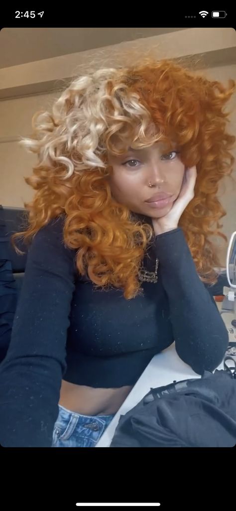 Show-Stopping Afro Hairstyles for Women Curly Hair Bright Colors, Red Hair With Blonde Skunk, Orange And Blonde Curly Hair, Burnt Orange And Blonde Hair, Orange And Black Curly Hair, Copper And Blonde Hair Curly, Ginger And Blonde Color Block Hair, Vivid Curly Hair, Ginger Hair With Blonde Skunk Stripe