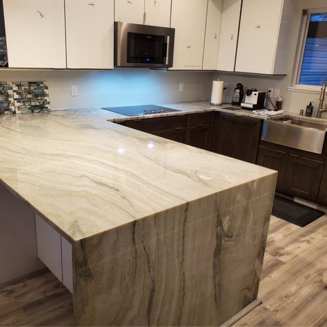 They say, don't go chasing waterfalls...🎶 But we say have at it! Especially when you can create stunning results like this by adding a waterfall countertop to your kitchen. Learn more about waterfall and other edge profiles we offer at https://mkdkitchens.com/resources/edge-profiles/ #waterfalledge #waterfallcountertop #waterfalledgeprofile #grayquartz #grayquartzcountertop #michigancountertops #michigankitchenremodeling #michiganquartz #michigangranite Countertop Edge Profiles, Dark Waterfall, Granite Countertop Edges, Grey Quartz Countertop, Waterfall Counter, Waterfall Island Kitchen, Waterfall Countertop, Granite Quartz Countertops, Kitchen Renovation Inspiration