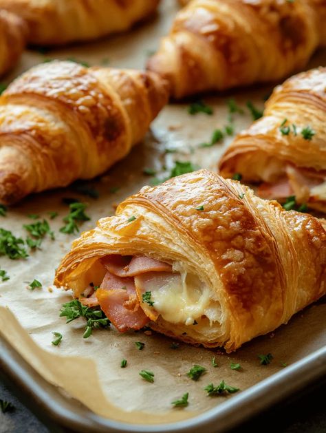 Cheesy Delight: Baked Ham and Cheese Croissants 🥐 Ham Croissant Bake, Ham Crossiants, Starbucks Ham And Swiss Croissant Copycat, Ham Croissant Sandwich, Stuffed Ham And Cheese Croissant, Hot Ham And Cheese Croissant, Baked Ham And Cheese Croissants, Ham And Cheese Croissant Bake, Breakfast Croissant Ideas