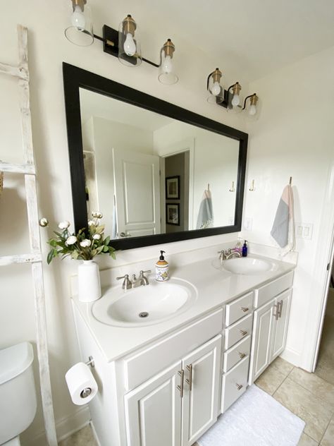 How to Frame a Bathroom Mirror - Love Your Abode Bathroom Mirror With Black Frame, Washroom Mirror Frame, How To Frame Your Bathroom Mirror, Bathroom Vanity With Black Mirror, Framed Vanity Mirror Double Sinks, Border Around Bathroom Mirror, Large Mirrors In Bathrooms, Frame Out Bathroom Mirror, Black Trim Mirror Bathroom