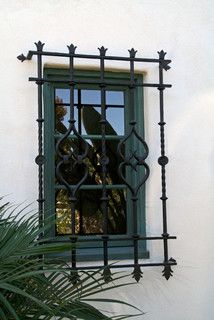 Spanish Balcony Ideas, Iron Window Grill, Boho Glam Home, Wrought Iron Garden Gates, Spanish Colonial Homes, Iron Garden Gates, Spanish Revival Home, Mediterranean Exterior, Window Bars