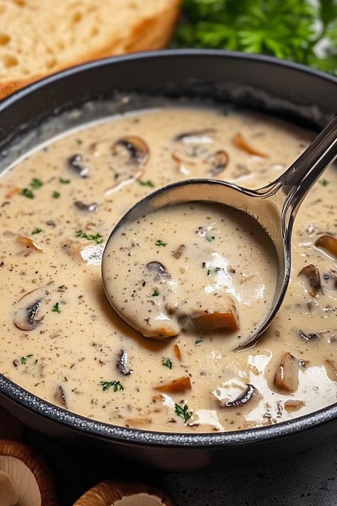 Warm up with a comforting bowl of rich, creamy mushroom soup. Made with fresh mushrooms, herbs, and a touch of garlic, this soup is perfect for chilly days and brings a restaurant-quality flavor to your kitchen. Save this recipe for an easy dinner #mushrooms #souprecipe #comfortfood #fallrecipes #easysouprecipe #cozymeals #homemadesoup #dinnerideas #souplovers Cream Of Wild Mushroom Soup, Tuscan Mushroom Soup, Slow Cooker Cream Of Mushroom Soup, Mushroom And Herb Soup, Prime Rib And Mushroom Soup, Best Cream Of Mushroom Soup Recipes, French Mushroom Soup Recipes, Mushroom Chicken Soup Recipes, Slovak Mushroom Soup Christmas Eve