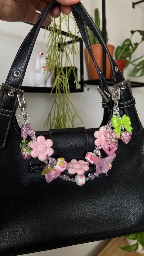 You don't need a new bag, you just need to charm! I created these chains to freshen up your old and new accessories, to personalize them and make them more unique to you!  Chain Length approx: shorter strap 11" , longer strap hangs 12"  + 6 handmade charms Colors: pink, green, white, silver  Materials, Metal, handcrafted beads, ceramic beads, plastic beads Collection: Strawberry Dew  Bag chains are not meant to hold weight but to decorate your accessories Personalized Bags Ideas, Decorated Bags Aesthetic, Bags With Charms Aesthetic, Cute Bag Keychains, Bags With Keychain, Decorate Bag Ideas, Bag Chain Accessories, Purse With Charms, Purse Accessories Ideas